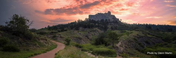 trail leading to pulpit rock and a pink sky at sunrise